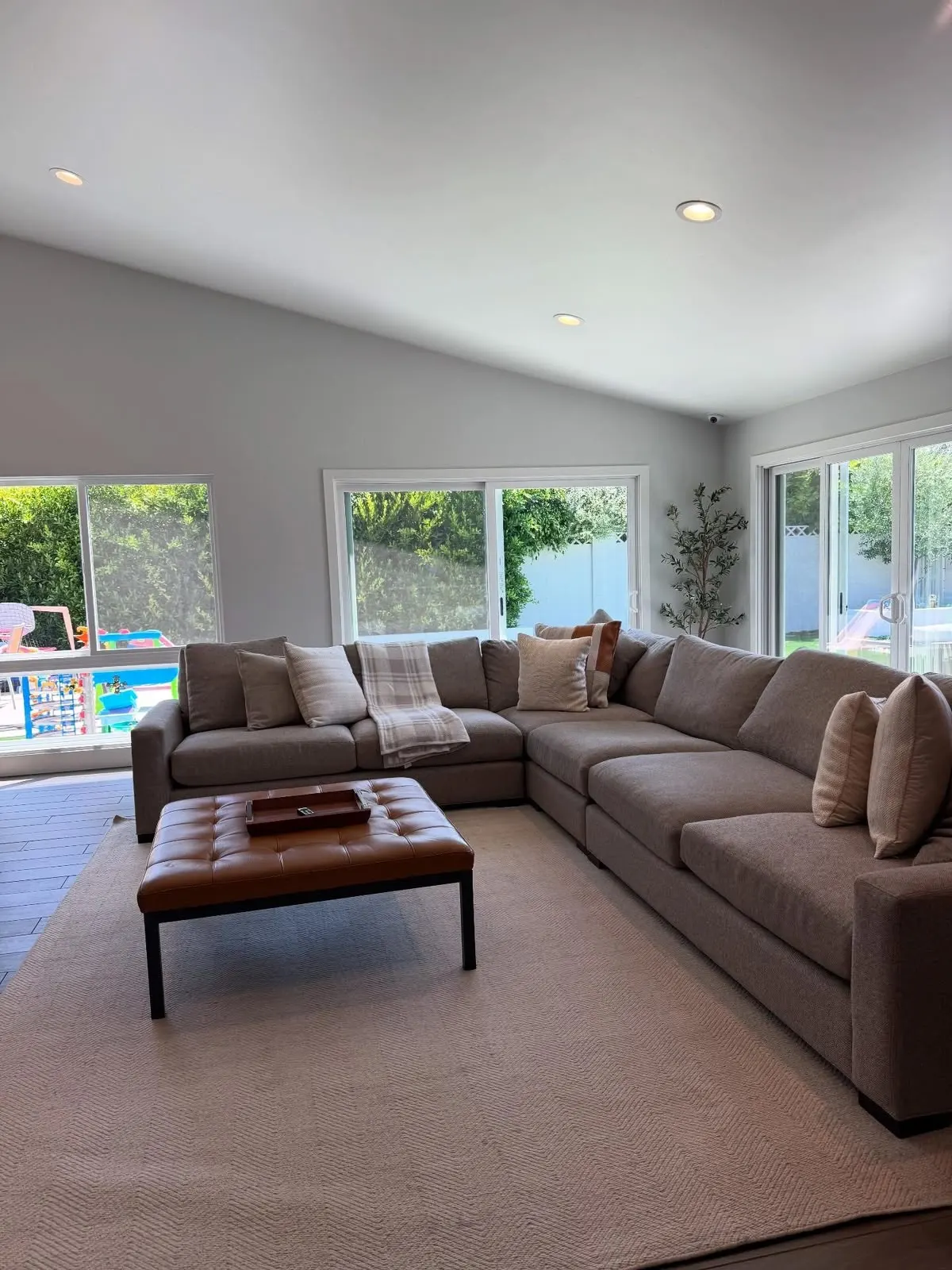 Clean living room with a sectional sofa in an Orange County home